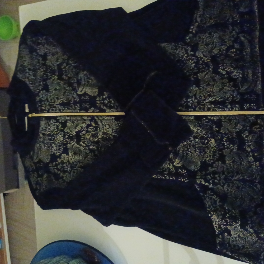 Jacket made by chico's brand is Zenergy NWOT